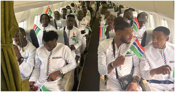 The Gambia national team aboard their flight before departing for AFCON in Ivory Coast.