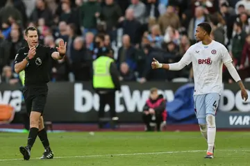 Aston Villa's Ezri Konsa reacts after referee Jarred Gillett disallowed a late West Ham goal