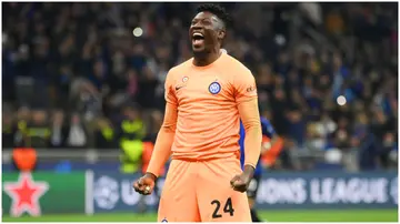 Andre Onana celebrates during the UEFA Champions League semi-final second leg match between FC Internazionale and AC Milan at Stadio Giuseppe Meazza. Photo by Mike Hewitt.