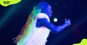 Naomi enters the stage during the 2017 WWE SummerSlam.