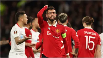  Bruno Fernandes reacts after being shown a yellow card by referee, Felix Zwayer, during the UEFA Europa League match between Manchester United and Sevilla.