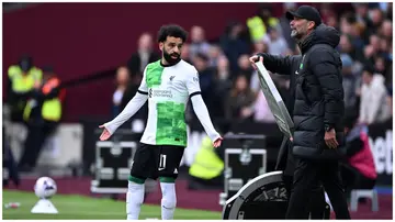 Mohamed Salah and his manager, Jurgen Klopp clash during Liverpool's clash with West Ham. Photos: Justin Setterfield.