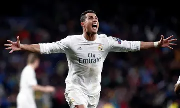 Cristiano Ronaldo of Real Madrid celebrates after scoring a goal during the UEFA Champions League game against Wolfsburg at Santiago Bernabeu Stadium.