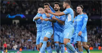 Joao Cancelo celebrates with teammates after scoring their side's fifth goal during the UEFA Champions League group A match against Leipzig (Photo by Matt McNulty - Manchester City/Manchester City FC via Getty Images)