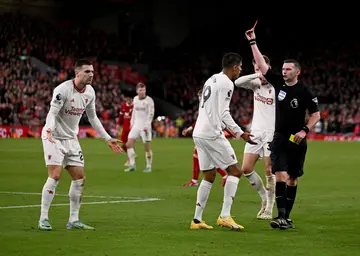 Liverpool vs Manchester United, Diogo Dalot, Michael Oliver