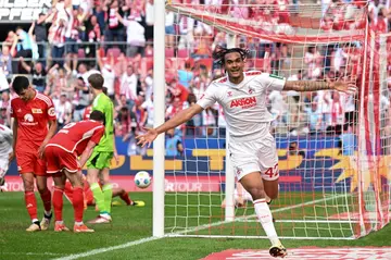 Damion Downs scored a 92nd-minute winner to give Cologne a stunning 3-2 comeback win against fellow relegation strugglers Union Berlin