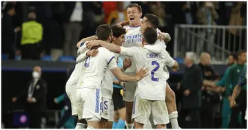 Real Madrid players celebrate after defeating Manchester City in the UEFA Champions League Semi-Final second leg match at Santiago Bernabeu. Photo by Burak Akbulut.