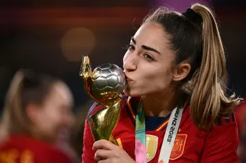 Spain captain and goalscorer Olga Carmona kisses the World Cup