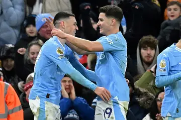 Julian Alvarez (right) was on target in Manchester City's victory over Sheffield United