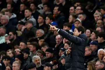 Pointing the way to victory: Chelsea boss Mauricio Pochettino signals to his side during their dramatic 4-3 win over Manchester United