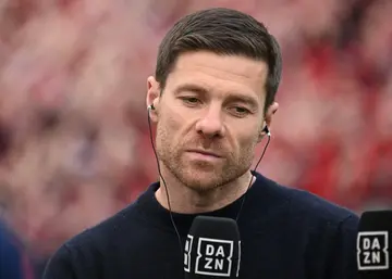 Tuned in: Bayer Leverkusen coach Xabi Alonso is interviewed prior to Sunday's game