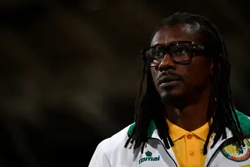 How old is Aliou Cisse?