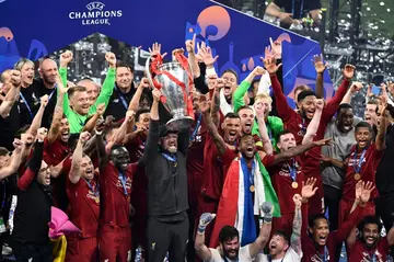 Jurgen Klopp lifts the Champions League trophy after Liverpool beat Tottenham to win the 2019 final