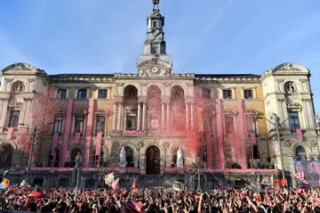 Athletic Bilbao supporters celebrate the club's first major silverware for 40 years at the city hall