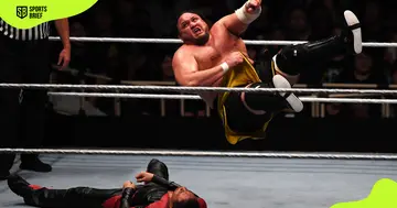 Samoa Joe (top) competes during a fight.