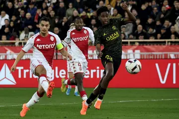 Wissam Ben Yedder (L) scores one of his two goals as Monaco beat Paris Saint-Germain 3-1 in Ligue 1 on Saturday