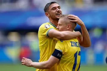 Roman Yaremchuk (L) got the winner for Ukraine in their second game at Euro 2024