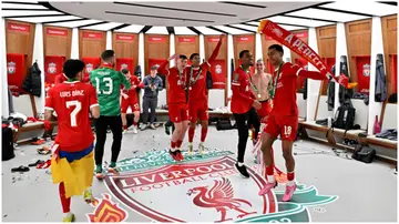 Liverpool players with the Carabao Cup in the dressing room after the final against Chelsea at Wembley Stadium. Photo by Andrew Powell.
