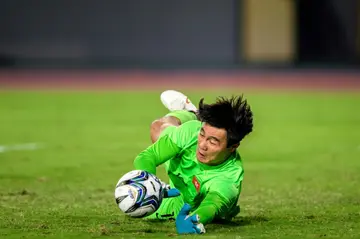 Hong Kong's Tse Ka-wing makes a save in the men's semifinal