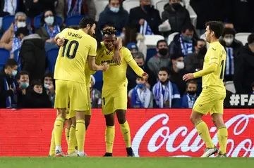 Samuel Chukwueze celebrates with teammates after scoring Villarreal's third goal against Real Sociedad
