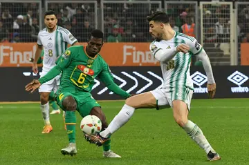 USM Alger star Aymen Mahious (R) playing for Algeria against Senegal in the African Nations Championship final.