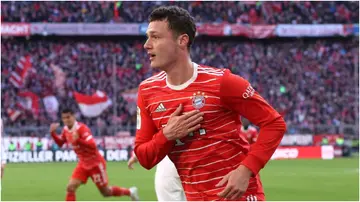 Benjamin Pavard celebrates after scoring during the Bundesliga match between FC Bayern Muenchen and FC Augsburg at Allianz Arena. Photo by Alexander Hassenstein.