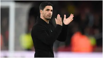 Mikel Arteta applauds Arsenal fans after the Premier League match between Arsenal FC and Chelsea FC at Emirates Stadium. Photo by Stuart MacFarlane.