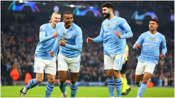 Manuel Akanji celebrates with teammates after scoring during the Champions League match between Manchester City and F.C. Copenhagen. Photo by Chris Brunskill.
