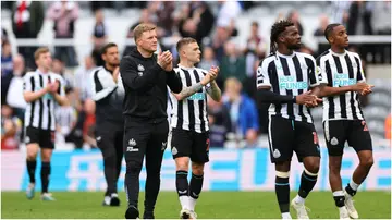 Newcastle United Players clap the fans during the Carabao Cup Fourth Round match between Manchester United and Newcastle United at Old Trafford in Manchester