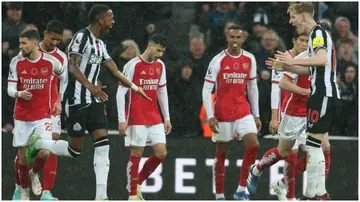 Joe Willock and Anthony Gordon celebrate during the Premier League match between Newcastle United and Arsenal at St. James' Park. Photo by Michael Driver.