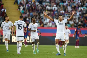 Real Madrid's English midfielder Jude Bellingham celebrates after scoring a brace against Barcelona in his first Clasico