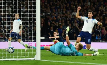 Harry Maguire (right) scored an own goal in England's 3-1 friendly win over Scotland