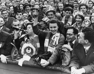 Arsenal fans at Wembley Stadium to see their team play Newcastle in the FA Cup final on 3rd May 1952