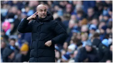 Pep Guardiola during the Premier League match between Man City and Liverpool at the Etihad Stadium. Photo by Martin Rickett.