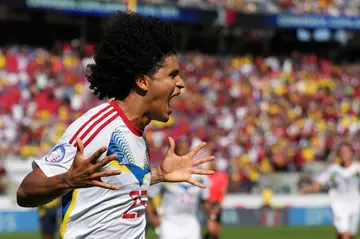 Eduard Bello of Venezuela celebrates after scoring his team's second goal in the 2-1 win over Ecuador in Copa America Group B on Saturday.