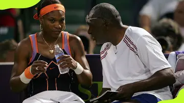 Richard Williams talks to his daughter, Serena Williams