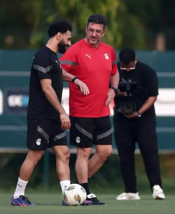 Egypt star Mohamed Salah with coach Rui Vitoria on Wednesday, the eve of his team's clash with Ghana in Abidjan