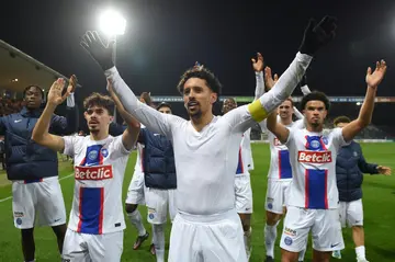 Marquinhos leads the Paris Saint-Germain celebrations after victory at Chateauroux