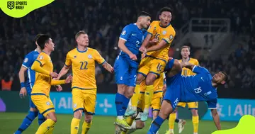 Kazakhstan's players (in yellow) in action against Greece's players