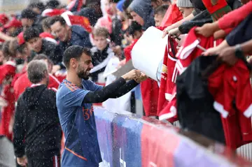 Bruno Fernandes signs autographs for fans in Perth