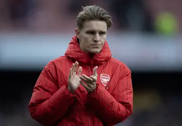 Martin Ødegaard acknowledges the home fans after defeat in the Premier League match between Arsenal FC and Aston Villa at Emirates Stadium