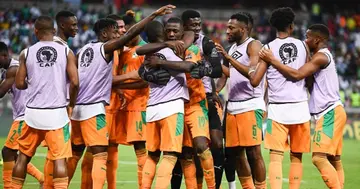 Nicolas Pepe celebrates with teammates after scoring his team's second goal during the Group E Africa Cup of Nations (CAN) 2021 football match against Sierra Leone. (Photo by CHARLY TRIBALLEAU / AFP).