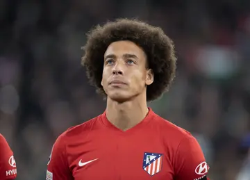 soccer players with a big afro