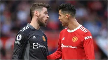 David de Gea and Cristiano Ronaldo talk to each other during the Premier League match between Manchester United and Norwich City at Old Trafford. Photo by Simon Stacpoole.