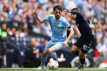Bernardo Silva (left) has been linked with a move to Barcelona from Manchester City