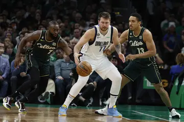 Jaylen Brown, Luka Doncic and Malcolm Brogdon at TD Garden