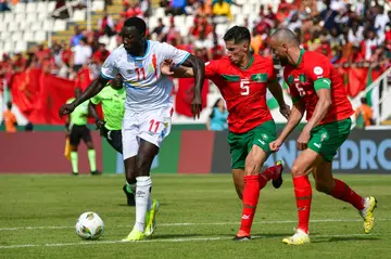 Silas Katompa Mvumpa (L) scored DR Congo's equaliser in a 1-1 draw with much-fancied Morocco