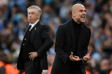 Pep Guardiola (right)  is one game away from ending Manchester City's wait to win the Champions League