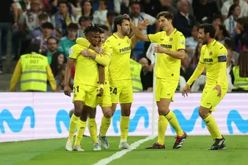 Villarreal midfielder Samu Chukwueze (L) celebrates scoring the winning goal against Real Madrid.