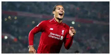 Liverpool star Van Dijk reacts to his team's loss to Man City at Anfield